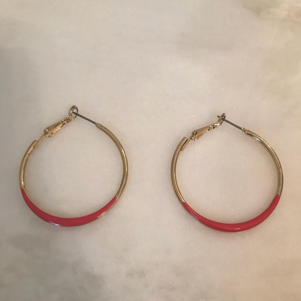 Gold tone hoops with neon pink accent